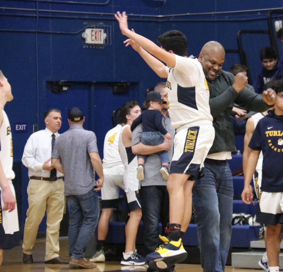 Turlock High School basketball coach John Williams is pictured celebrating in 2020. Williams, 48, died Friday, Dec. 29, 2023, from injuries suffered in a car crash.