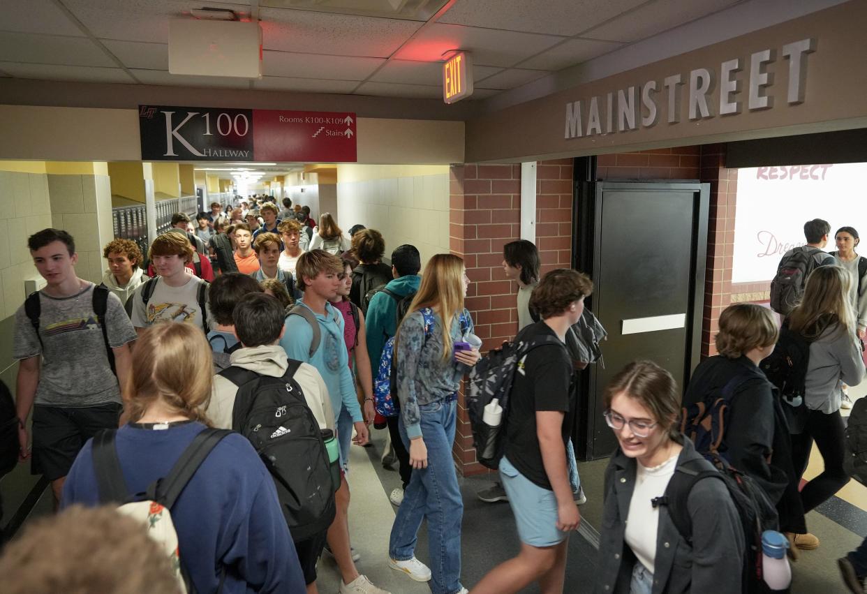 The Lake Travis school board is considering a new book review process that has some parents and students worried it will limit access to information. In this Feb. 14 photo, students walk to class at Lake Travis High School.