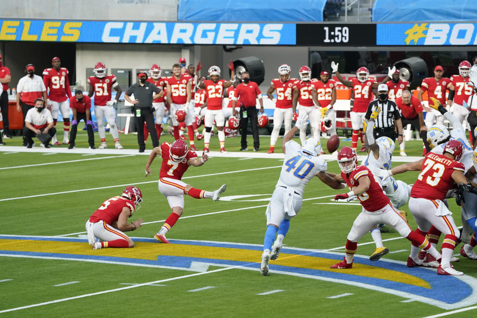 Kansas City Chiefs kicker Harrison Butker (7) hits the game-winning field goal during overtime of an NFL football game against the Los Angeles Chargers Sunday, Sept. 20, 2020, in Inglewood, Calif. Kansas City won 23-20. (AP Photo/Ashley Landis )