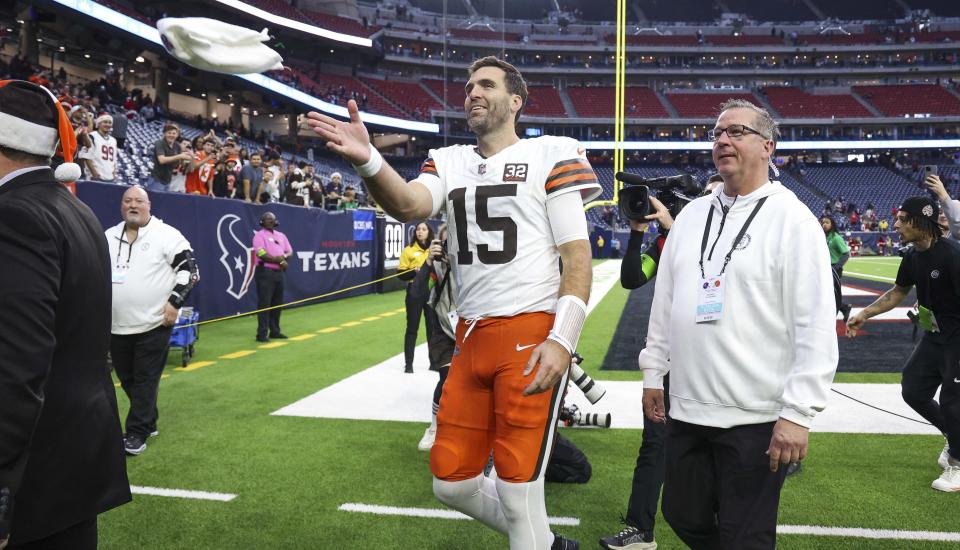 Browns quarterback Joe Flacco throws a towel to fans after a game at the Houston Texans, Dec. 24, 2023.