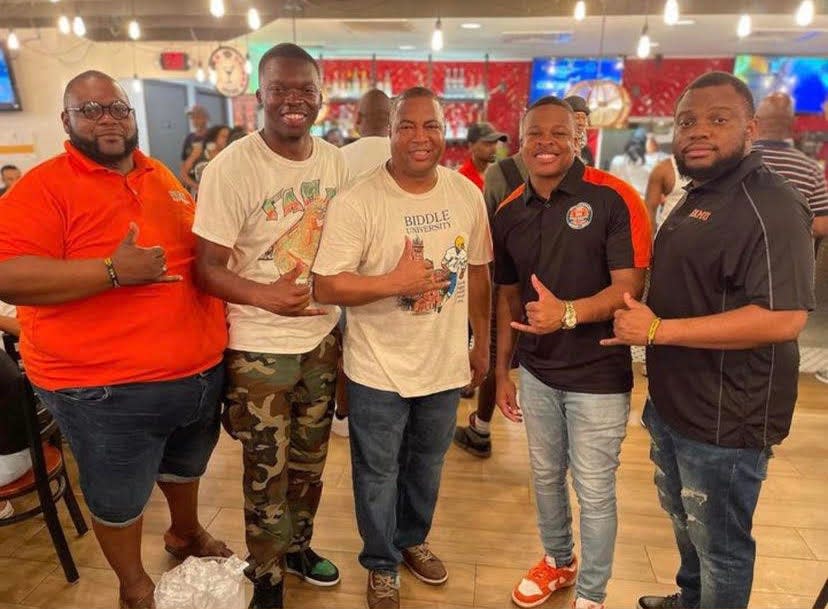 FAMU's Andre Green (far left) takes a photo with his fraternity brothers of the Alpha Phi Alpha Fraternity.