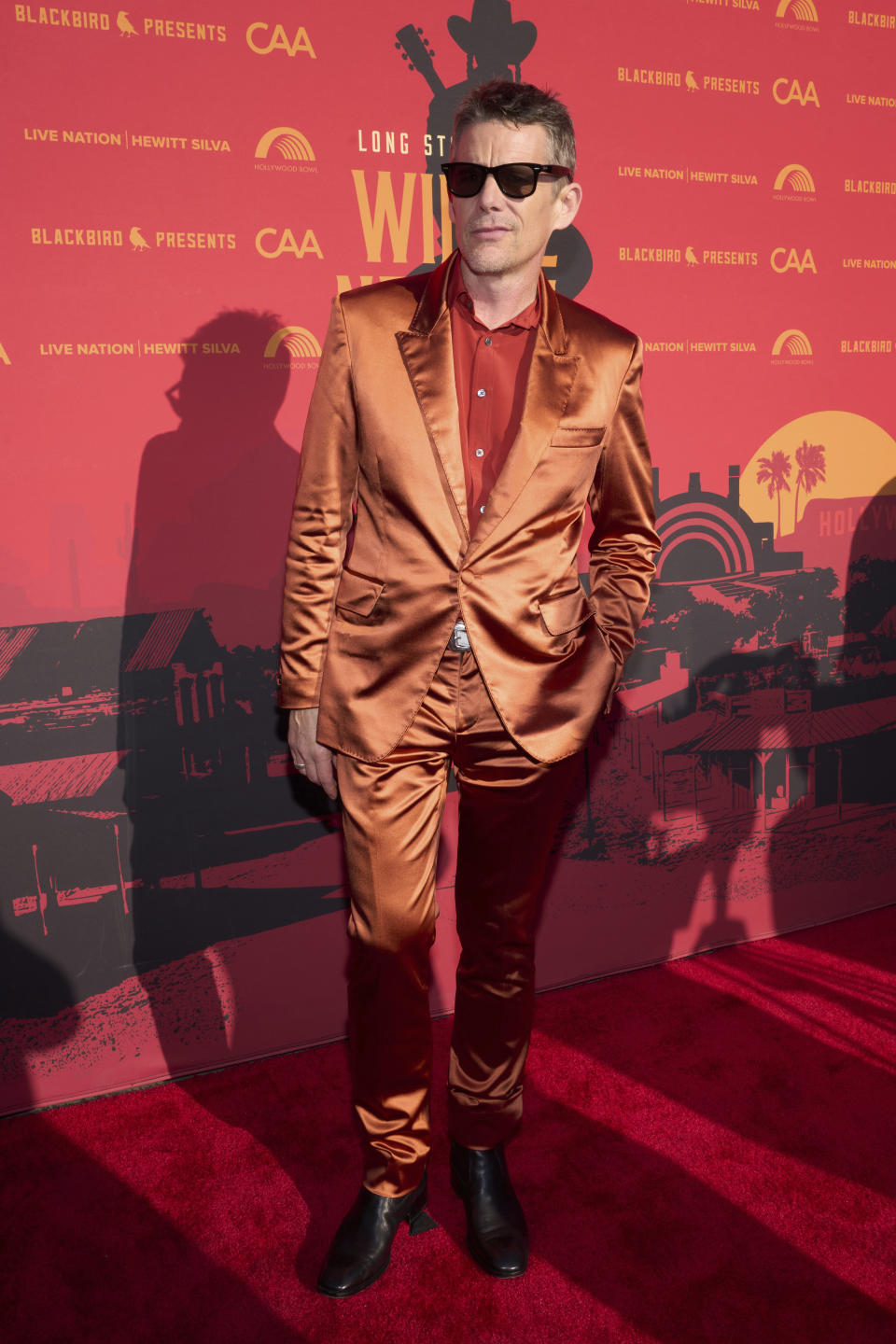 Ethan Hawke arrives at Willie Nelson 90, celebrating the singer's 90th birthday on Saturday, April 29, 2023, at the Hollywood Bowl in Los Angeles. (Photo by Allison Dinner/Invision/AP)