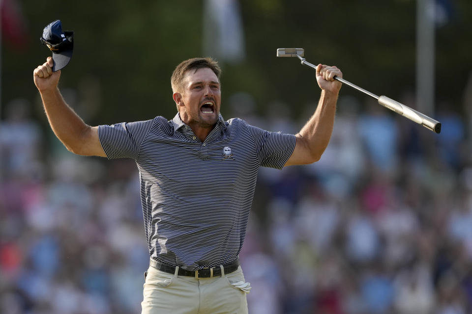 Bryson DeChambeau celebrates after winning the U.S. Open golf tournament Sunday, June 16, 2024, in Pinehurst, N.C. (AP Photo/Matt York)