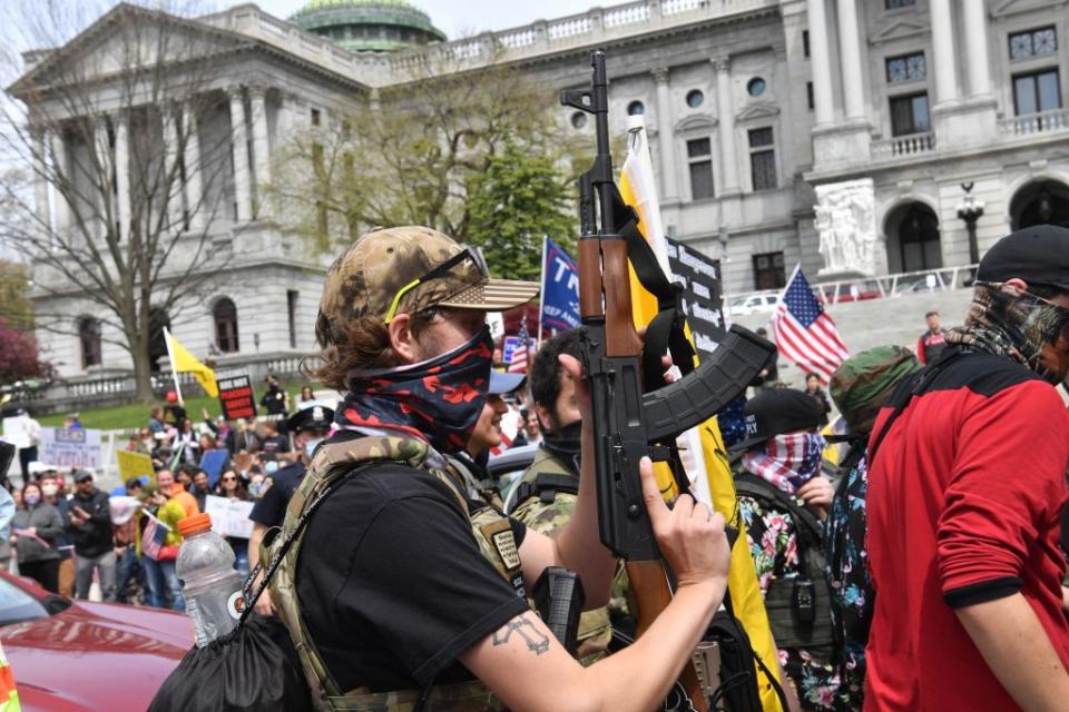 People take part in a 'reopen' Pennsylvania demonstration on April 20, 2020. Source: Getty