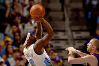 DENVER, CO - MAY 10: Ty Lawson #3 of the Denver Nuggets shoots over Steve Blake #5 of the Los Angeles Lakers in Game Six of the Western Conference Quarterfinals in the 2012 NBA Playoffs at Pepsi Center on May 10, 2012 in Denver, Colorado. NOTE TO USER: User expressly acknowledges and agrees that, by downloading and or using this photograph, User is consenting to the terms and conditions of the Getty Images License Agreement. (Photo by Justin Edmonds/Getty Images)