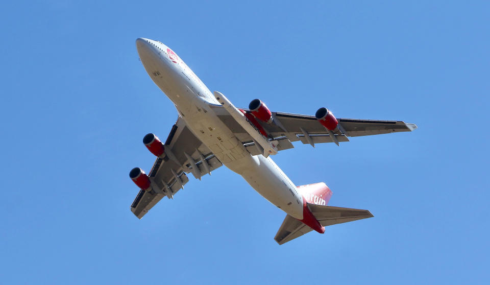Virgin Orbit Boeing 747-400 rocket launch platform, named Cosmic Girl, takes off from Mojave Air and Space Port, Mojave (MHV) on its second orbital launch demonstration in the Mojave Desert, north of Los Angeles. (AP Photo/Matt Hartman)