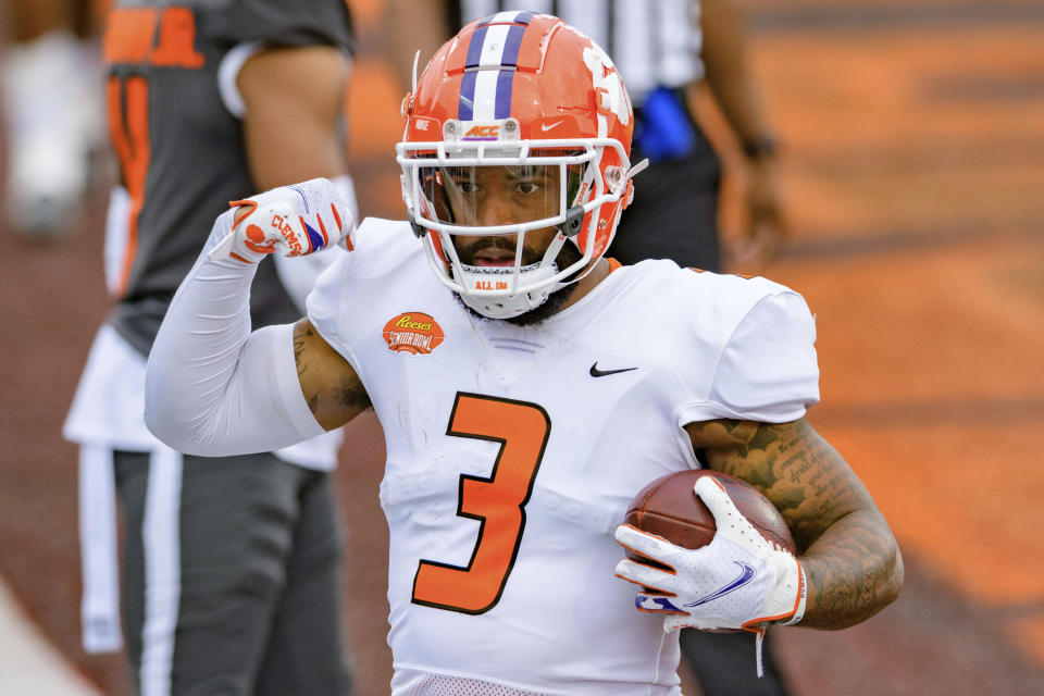 American Team wide receiver Amari Rodgers of Clemson (3) celebrates a score during the NCAA Senior Bowl college football game in Mobile, Ala., Saturday, Jan. 30, 2021. (AP Photo/Matthew Hinton)