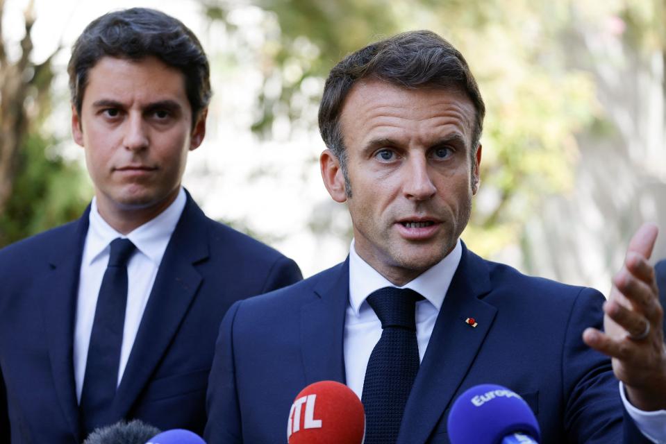 France’s President Emmanuel Macron with Mr Attal (AFP via Getty Images)