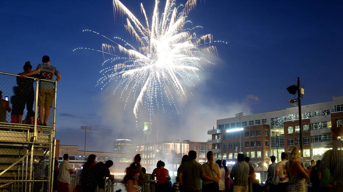 Spectators watch the fireworks display at the end of a Durham Bulls game July 4, 2016.