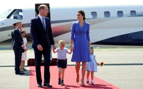 The Duke and Duchess of Cambridge took their children on tour to Poland and Germany last year - Credit: Reuters