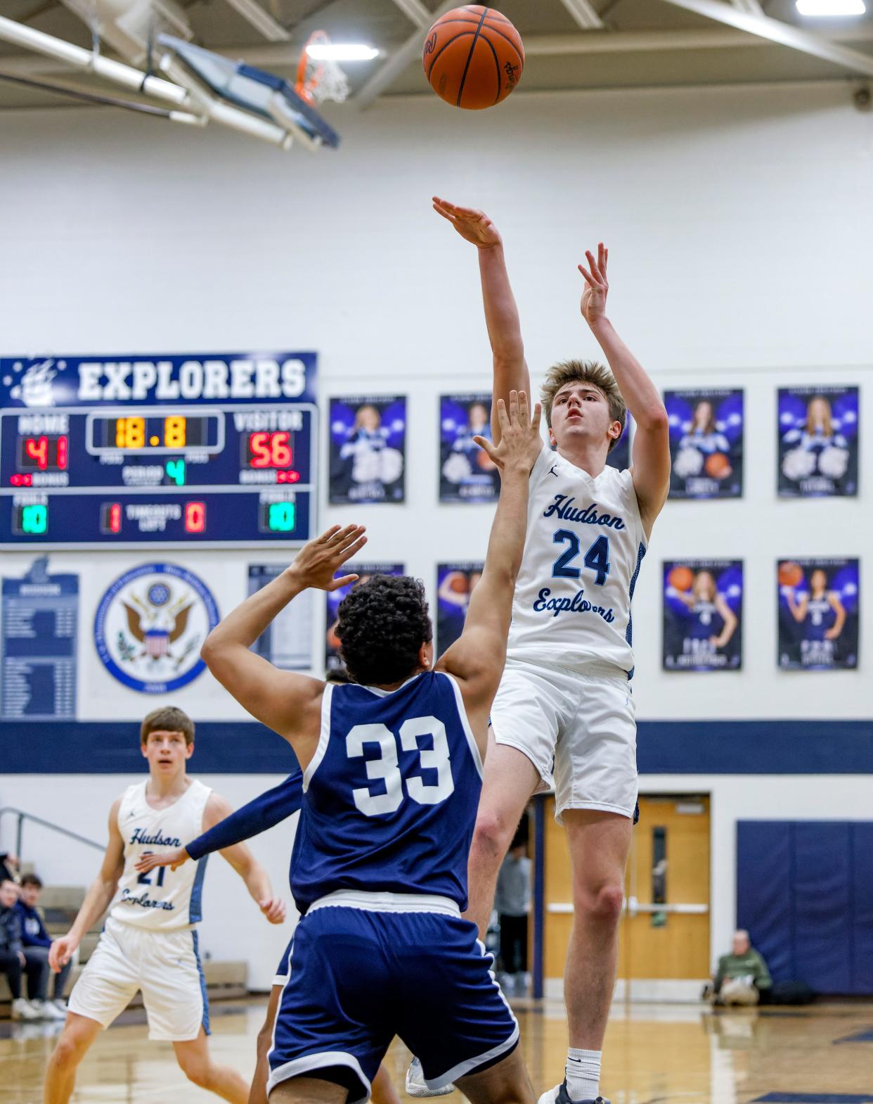 Hudson's Nolan Yanak puts up a shot over Twinsburg's Sean Cleveland during a game earlier this season.