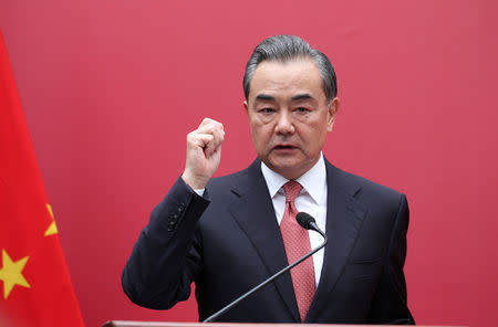 FILE PHOTO: China's Foreign Minister Wang Yi speaks during the opening of a new Chinese Embassy in the Dominican Republic, in Santo Domingo, Dominican Republic, September 21, 2018. REUTERS/Ricardo Rojas