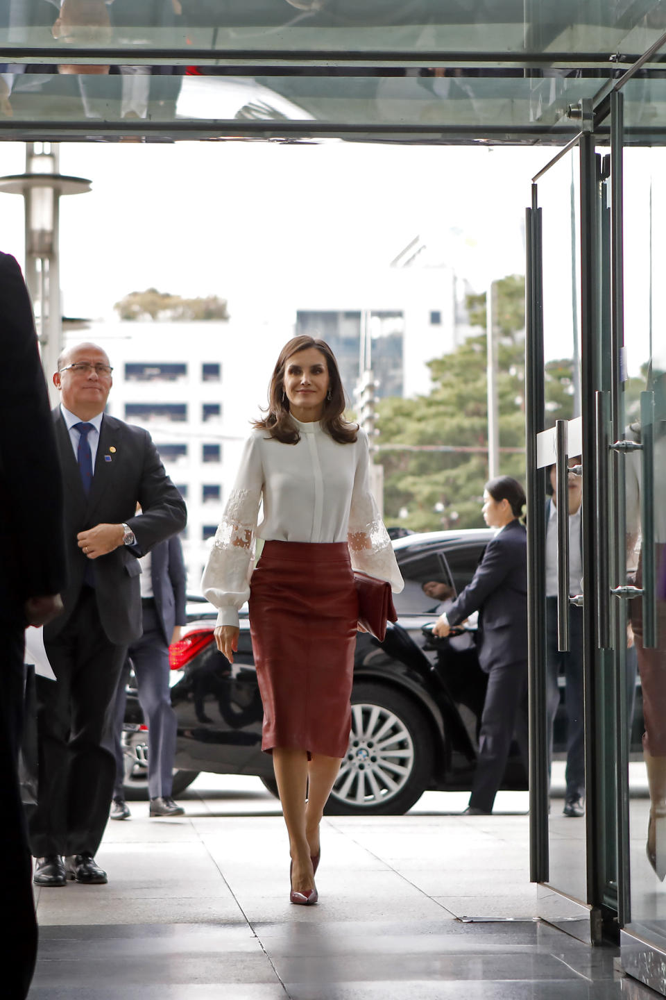 Queen Letizia of Spain wore the same skirt in South Korea on October 24, 2019. [Photo: Getty]