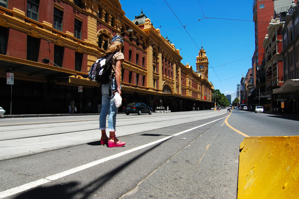 Woman stands in the middle of the street. Source: Getty Images