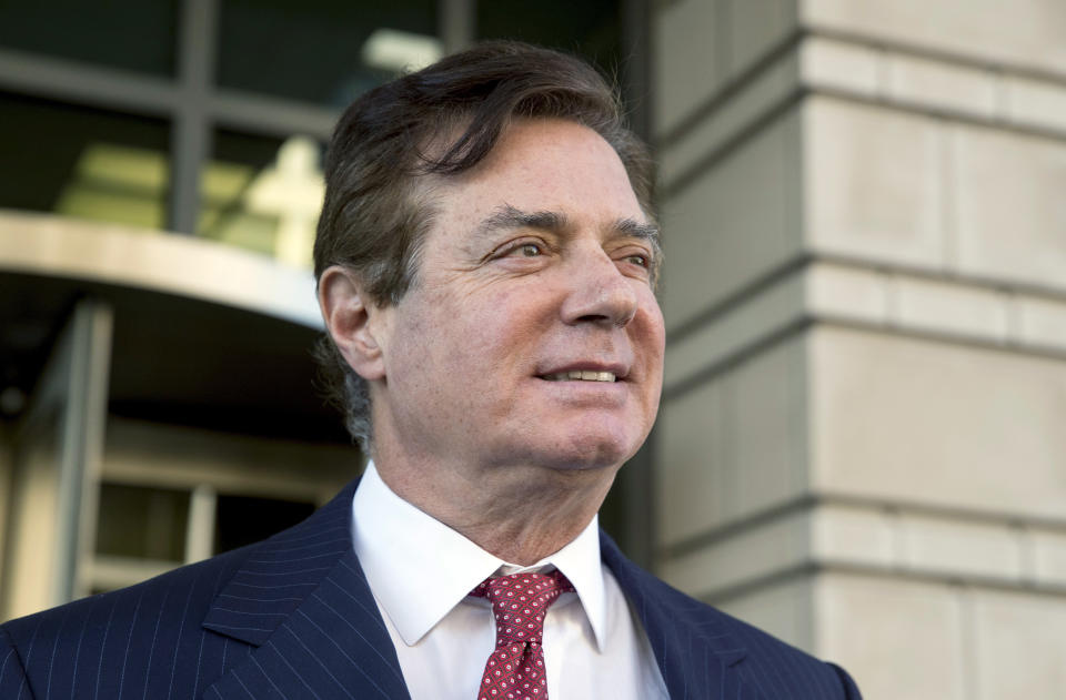 FILE - In this Nov. 2, 2017, file photo, Paul Manafort, President Donald Trump's former campaign chairman, leaves Federal District Court, in Washington. Manafort has been released from federal prison to serve the rest of his sentence in home confinement over concerns about the coronavirus, his lawyer said Wednesday. (AP Photo/Andrew Harnik, File)