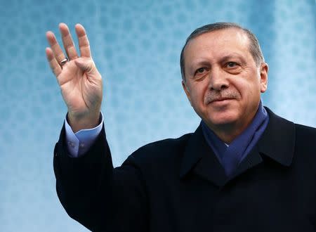 Turkish President Tayyip Erdogan greets his supporters during a rally for the upcoming referendum in the Kurdish-dominated southeastern city of Diyarbakir, Turkey, April 1, 2017. REUTERS/Murad Sezer