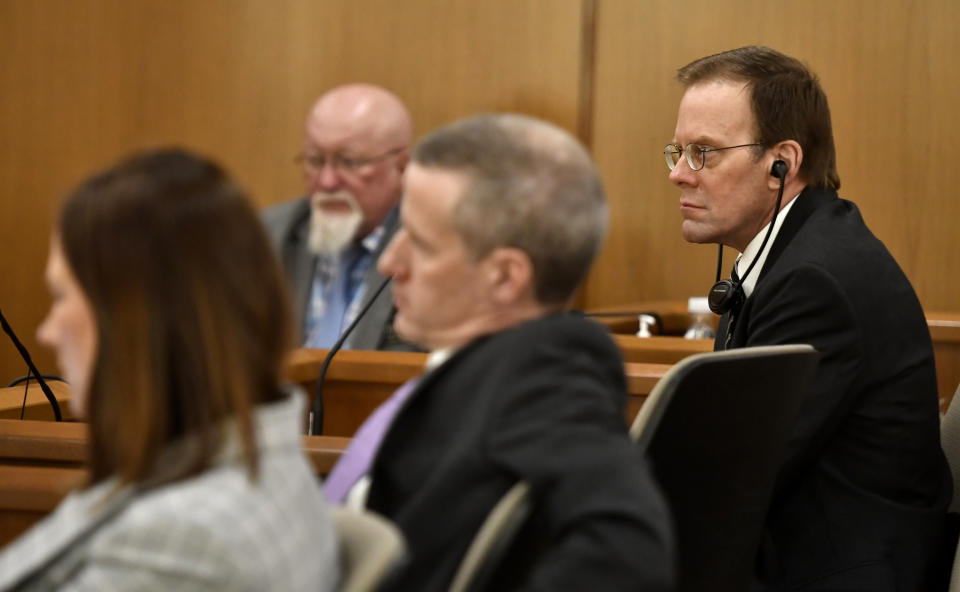 Mark Jensen, right, listens as the state gives its opening statement during his trial at the Kenosha County Courthouse on Wednesday, Jan. 11, 2023, in Kenosha, Wis. The Wisconsin Supreme Court ruled in 2021 that Jensen deserved a new trial in the 1998 death of his wife Julie Jensen, who was poisoned with antifreeze. (Sean Krajacic/The Kenosha News via AP, Pool)