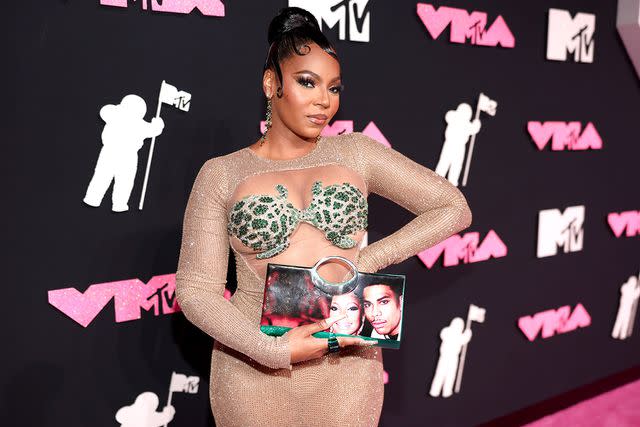 <p>Christopher Polk/Variety via Getty</p> Ashanti walks the carpet at the 2023 VMAs