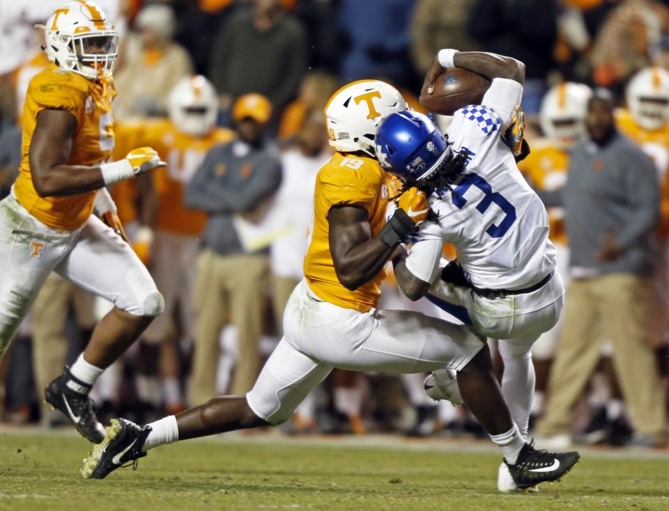 Kentucky quarterback Terry Wilson (3) is sacked by Tennessee linebacker Darrell Taylor (19) in the second half of an NCAA college football game Saturday, Nov. 10, 2018, in Knoxville, Tenn. Tennessee won 24-7. (AP Photo/Wade Payne)