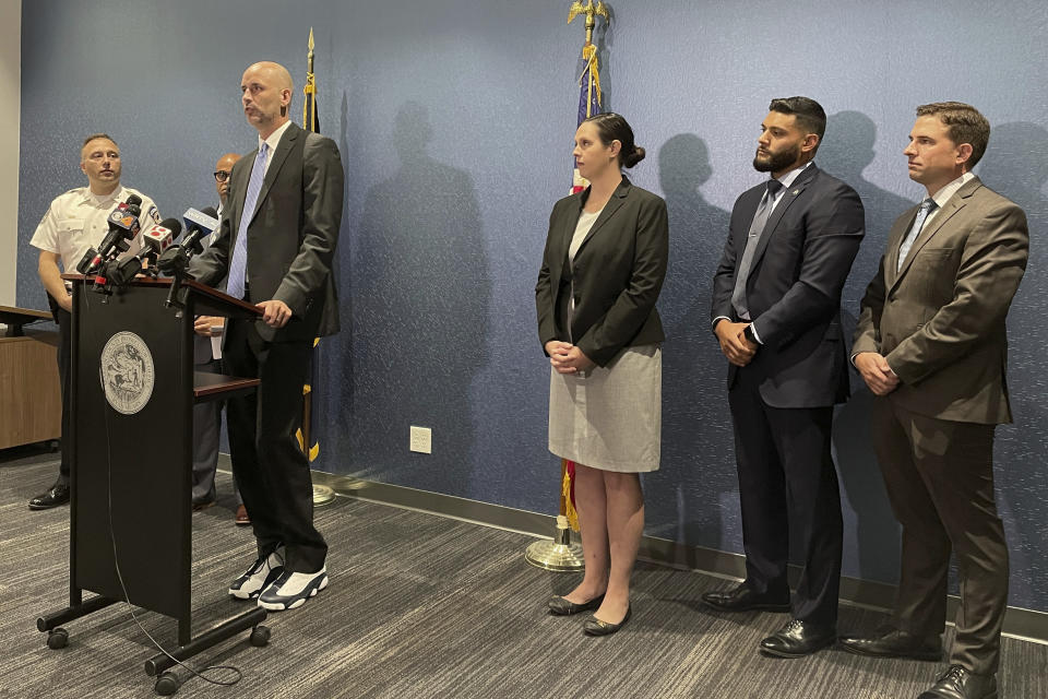 Marion County prosecutor Ryan Mears announces murder charges Thursday, Sept. 1, 2022, against a 22-year-old man who shot three Dutch soldiers, one fatally, over the weekend in downtown Indianapolis. (AP Photo/Arleigh Rodgers)