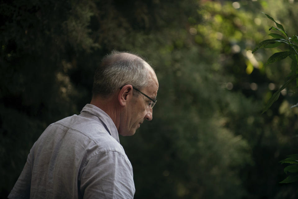 Tarquin Shaw, father of late English tourist Catherine Shaw, visits the hotel MayAchik where his daughter stayed in San Juan La Laguna, Guatemala, Tuesday, March 12, 2019. The English tourist whose body was found near a Guatemala highland lake popular with travelers died of hemorrhaging resulting from a traumatic brain injury, according to an autopsy report completed Tuesday. (AP Photo/Santiago Billy)