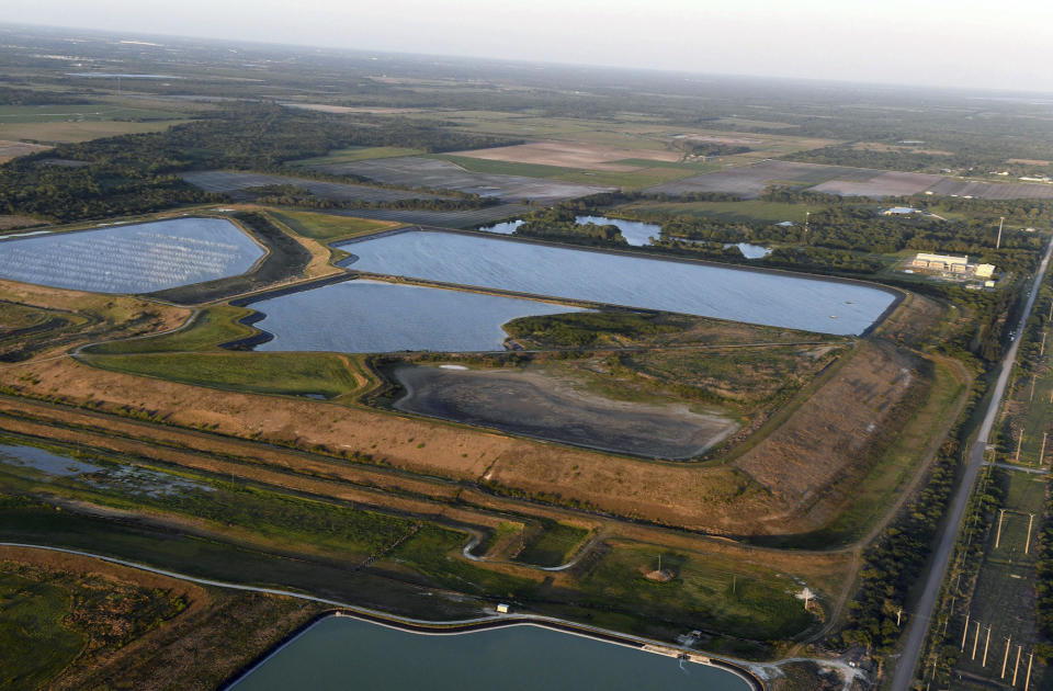 This aerial photo shows a reservoir near the old Piney Point phosphate mine, Saturday, April 3, 2021. / Credit: Tiffany Tompkins/The Bradenton Herald via AP