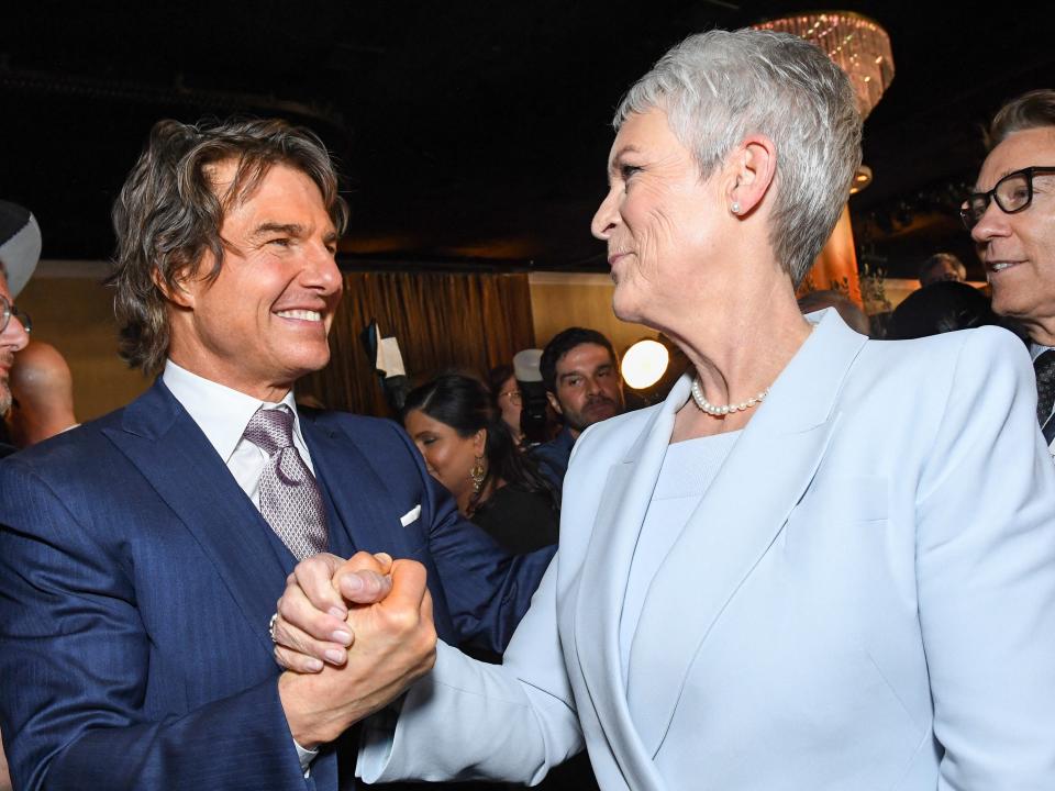 Tom Cruise and Jamie Lee Curtis arrive at the 95th Annual Oscars Nominees Luncheon at The Beverly Hilton on February 13, 2023 in Beverly Hills, California.