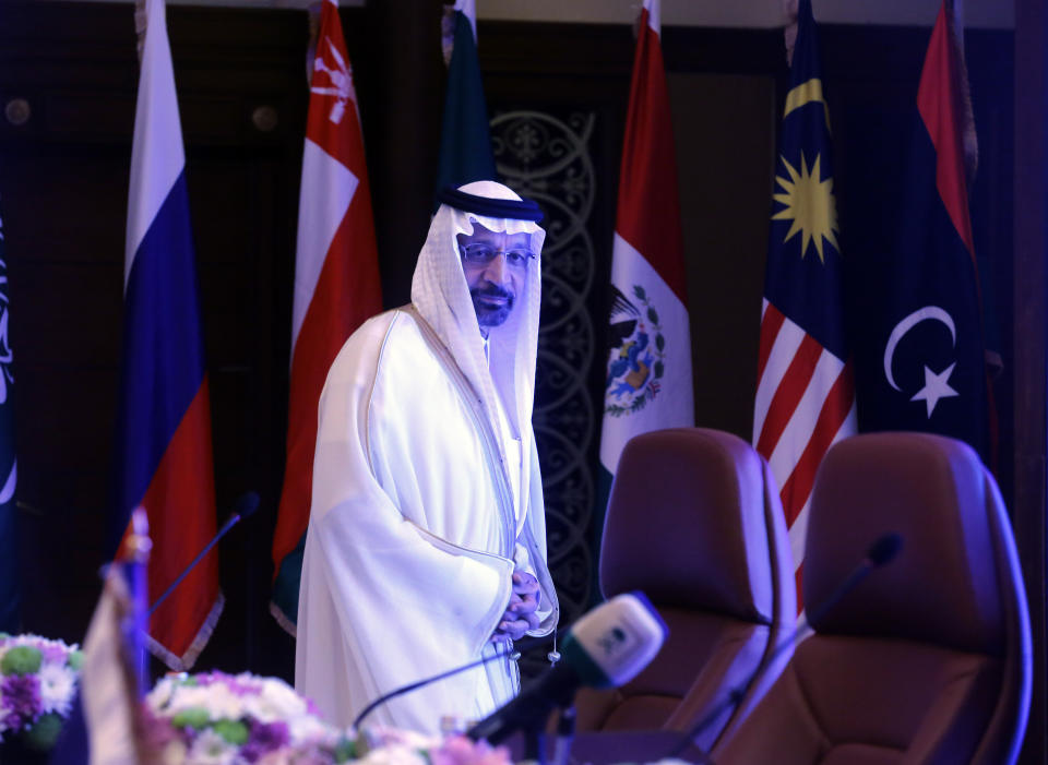 Saudi Minister of Energy, Industry and Mineral Resources Khalid al-Falih prepares to chair a meeting of energy ministers from OPEC and its allies to discuss prices and production cuts, in Jiddah, Saudi Arabia, Sunday, May 19, 2019. The meeting takes places as tensions flare in the Persian Gulf after the U.S. ordered bombers and an aircraft carrier to the region over an unexplained threat they perceive from Iran, which comes a year after the U.S. unilaterally pulled out of Tehran's nuclear deal with world powers and reimposed sanctions on Iranian oil. (AP Photo/Amr Nabil)