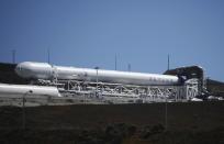 A SpaceX upgraded Falcon 9 rocket undergoes launch preparations at Vandenberg Air Force Base in California September 27, 2013. Privately owned Space Exploration Technologies plans to test an upgraded Falcon 9 rocket on Sunday from a site in California as part of its push into the satellite launch market. Perched on top of the 22-story, beefed-up Falcon 9 will be Canada�s Cassiope science satellite. Liftoff is targeted for 9 a.m. PDT (1600 GMT). �This is essentially a development flight for the rocket,� company founder and chief executive Elon Musk told Reuters. REUTERS/Gene Blevins (UNITED STATES - Tags: SCIENCE TECHNOLOGY BUSINESS)