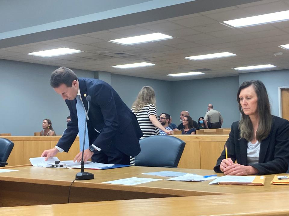 Travis Page and Gastonia Police Department attorney Laura Burton sit in Gaston County Superior Court.