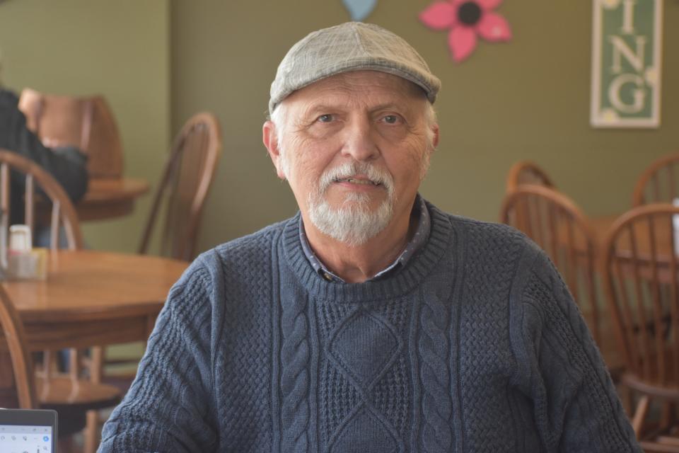 Bob Weaver enjoys writing, coffee and bagels at Pelican Coffee House in Bucyrus.