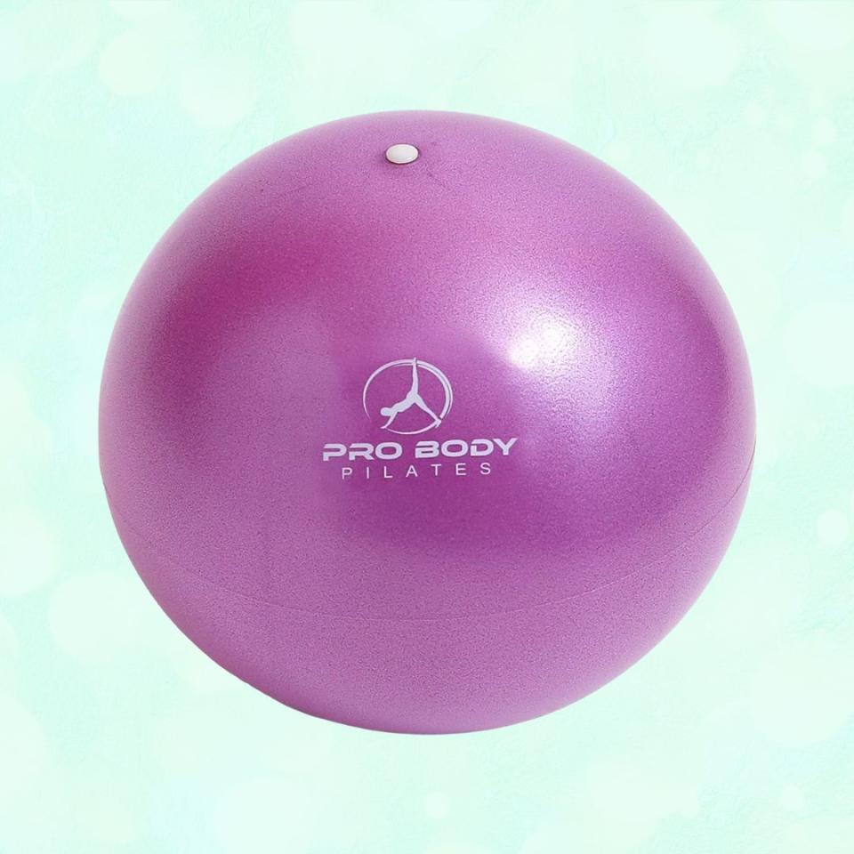 During mat Pilates, using an exercise ball is helpful in supporting your back, providing stability for your core muscles and achieving the correct posture while doing different moves. This mini 9-inch ball comes in multiple colors, including purple, blue, black, gray and yellow. Promising review: 