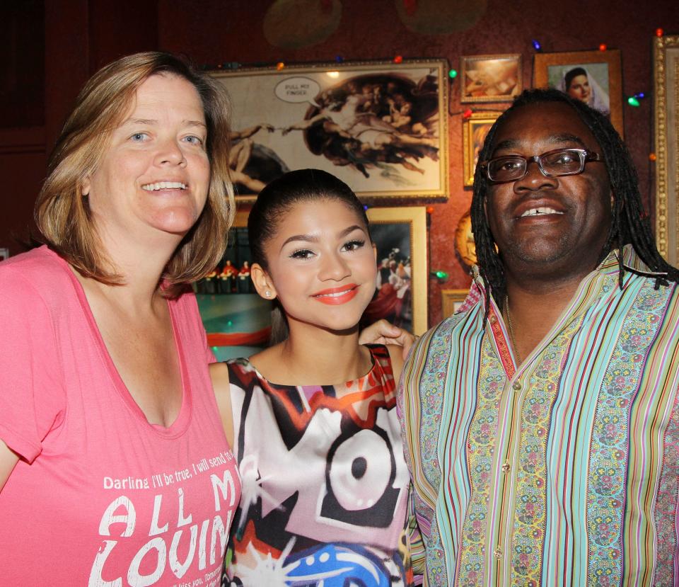 Zendaya with her mother and father