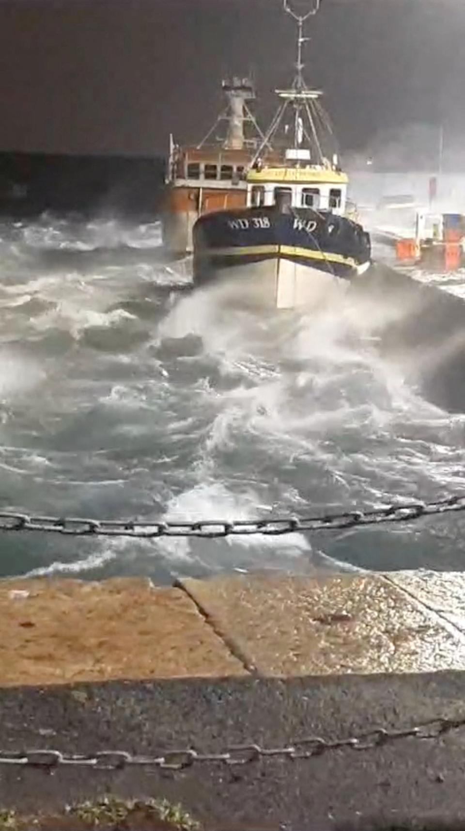 Waves hit a structure at the Ireland coastline during Storm Isha in Dublin (via REUTERS)