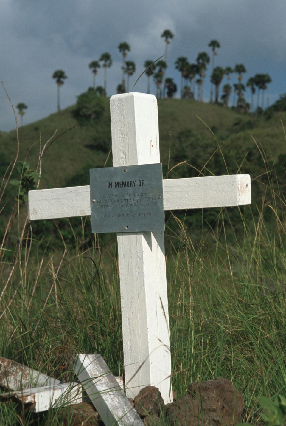 A grave for a German tourist who disappeared and is thought to have been eaten by Komodo dragons.