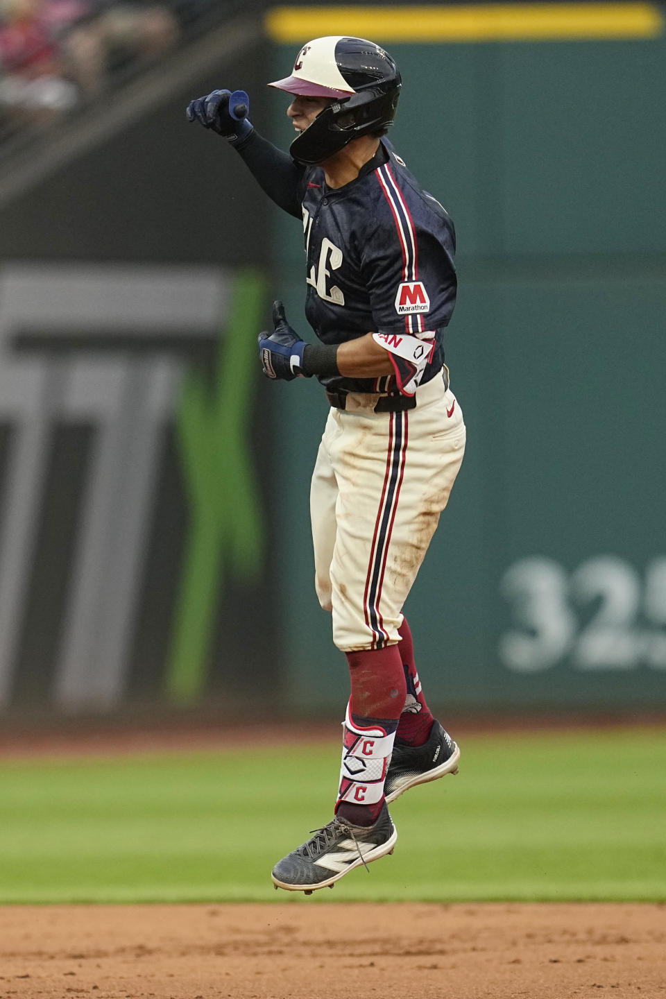 Cleveland Guardians' Tyler Freeman celebrates as he runs the bases with a home run in the sixth inning of a baseball game against the Chicago White Sox, Tuesday, July 2, 2024, in Cleveland. (AP Photo/Sue Ogrocki)