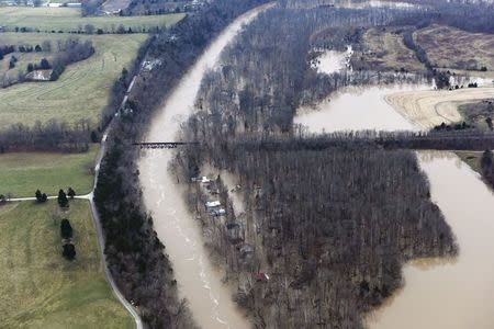 Submerged roads and houses are seen after several days of heavy rain led to flooding, in an aerial view over Union, Missouri December 29, 2015. REUTERS/Kate Munsch