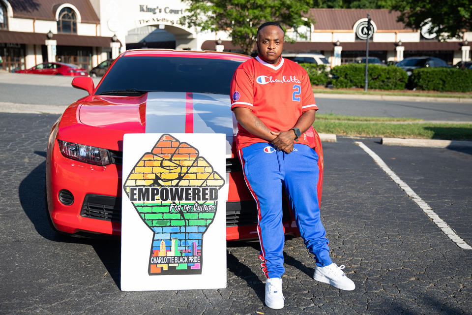 Lowery poses on the hood of his car in the Midtown neighborhood of Charlotte, North Carolina, on June 18, 2021.