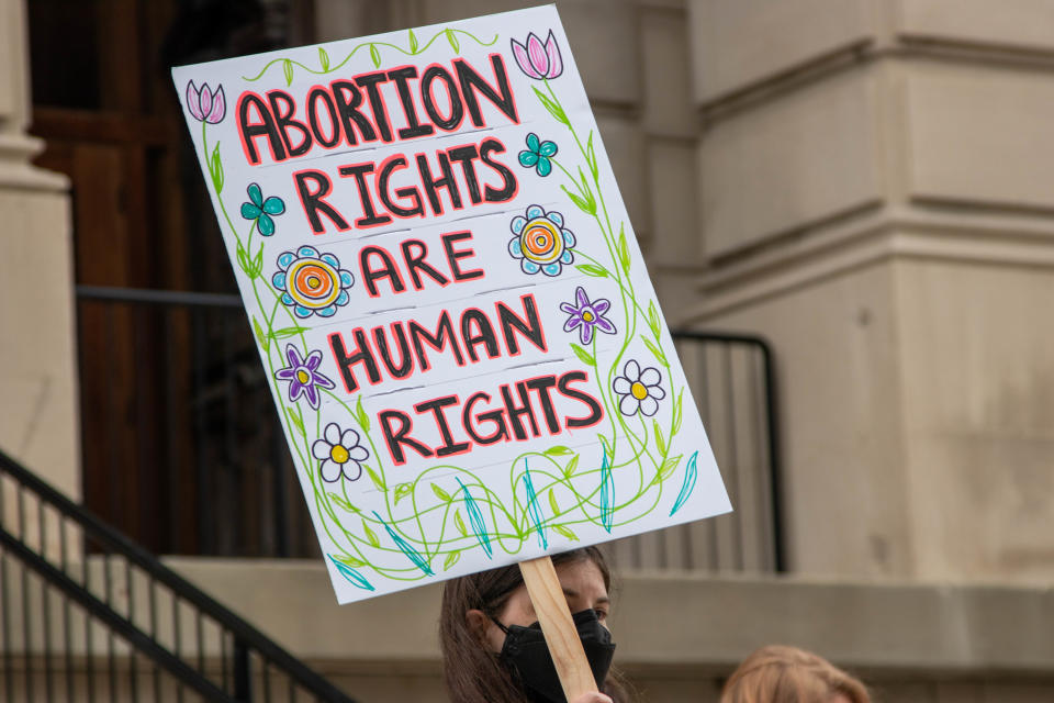 Outside of the Tippecanoe County Courthouse, protesters demonstrate as a response to the leaked Supreme Court opinion regarding the overturning of Roe v. Wade, on May 3, 2022, in Lafayette.