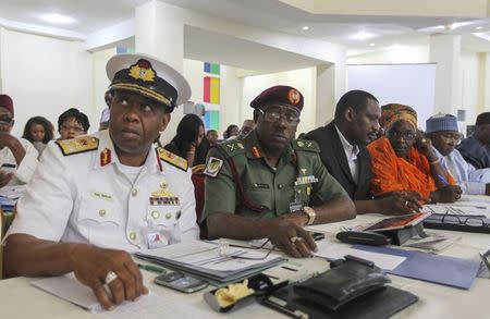 Nigerian navy and military medical directors attend the second general meeting with Nigeria's Health Minister Onyebuchi Chukwu (not pictured) during a media briefing on updates regarding the ongoing national Ebola disease outbreak, in Abuja September 1, 2014. REUTERS/Afolabi Sotunde