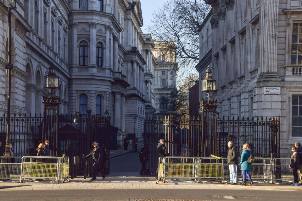 London, UK - January 14th 2022. Armed police officers outside the Downing Street gates.