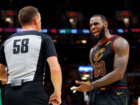 May 19, 2018; Cleveland, OH, USA; Cleveland Cavaliers forward LeBron James (23) argues with referee Josh Tiven (58) during the second half against the Boston Celtics in game three of the Eastern conference finals of the 2018 NBA Playoffs at Quicken Loans Arena. Mandatory Credit: Rick Osentoski-USA TODAY Sports