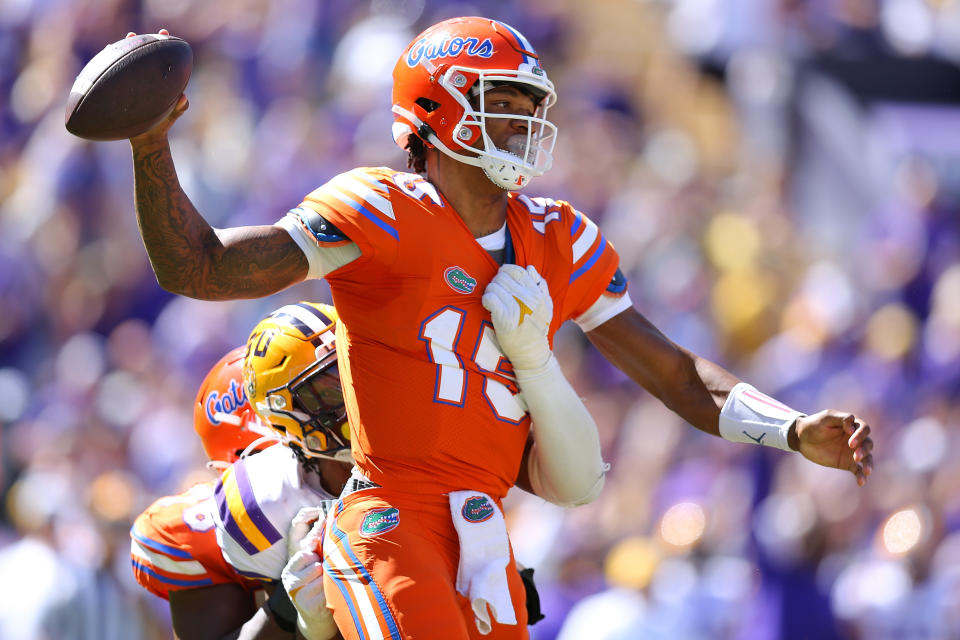 BATON ROUGE, LOUISIANA - OCTOBER 16: Anthony Richardson #15 of the Florida Gators throws the ball under pressure from BJ Ojulari #8 of the LSU Tigers during the second half at Tiger Stadium on October 16, 2021 in Baton Rouge, Louisiana. (Photo by Jonathan Bachman/Getty Images)