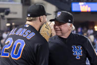 New York Mets' Pete Alonso (20) celebrates the win with manager Buck Showalter after a baseball game against the Pittsburgh Pirates, Friday, Sept. 16, 2022, in New York. (AP Photo/Corey Sipkin)