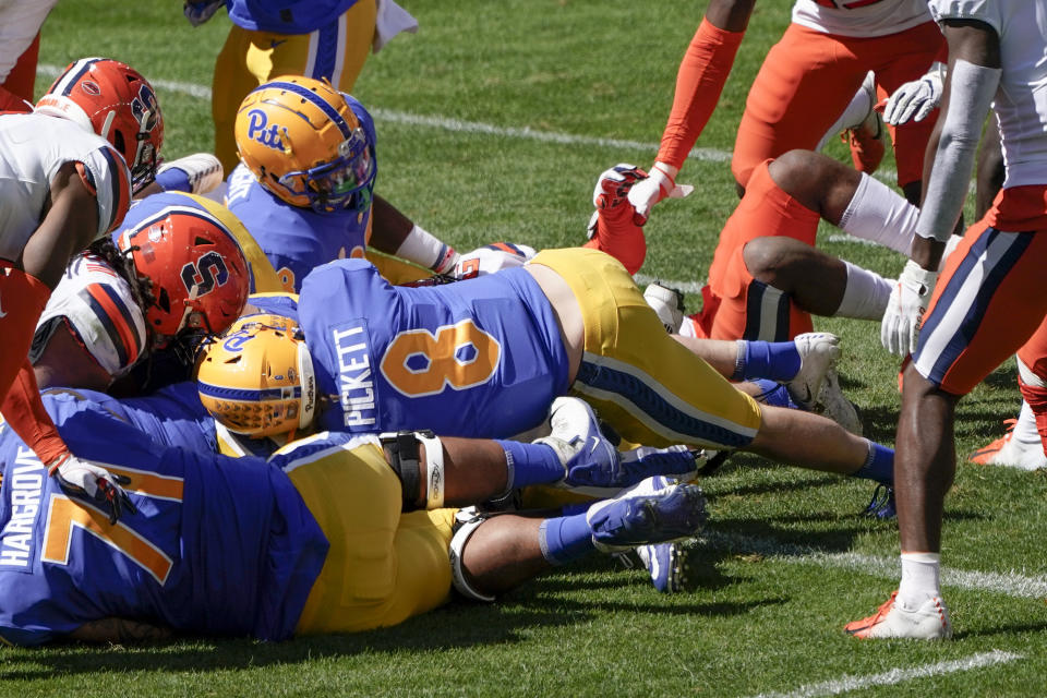 Pittsburgh quarterback Kenny Pickett (8) pushes across the goal line for a touchdown against Syracuse during the first half of an NCAA college football game, Saturday, Sept. 19, 2020, in Pittsburgh. (AP Photo/Keith Srakocic)