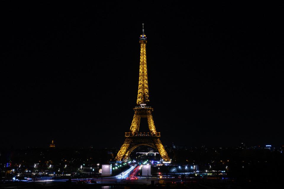 This long exposure photograph taken on December 2, 2023, shows a general view of the Eiffel tower in central Paris.