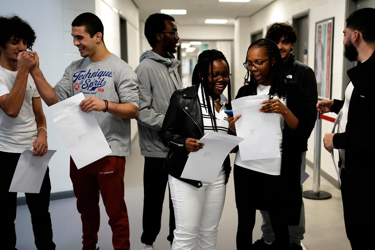 Students at Ark Acton Academy in Acton, west London, receive their A-level results (PA)