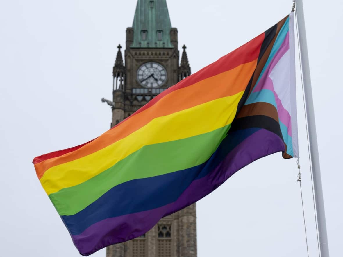 The Progress Pride flag flies on Parliament Hill on June 1, 2022, in Ottawa.  Several communities in Canada have recently had debates over flying Pride flags. (Adrian Wyld/The Canadian Press - image credit)
