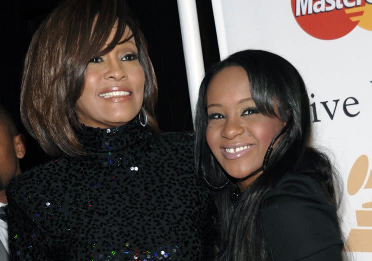 Whitney Houston with her daughter Bobbi Kristina at an event in 2011. (Photo: AP Images)