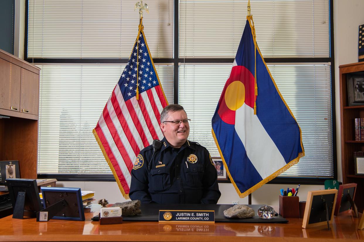 Outgoing Larimer County Sheriff Justin Smith poses for a portrait in his office Wednesday, Jan. 4, at the Larimer County Sheriff's Office.